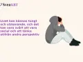 En person sitter med huvudet i händerna, en bild som kan illustrera prestationsångest symptom.