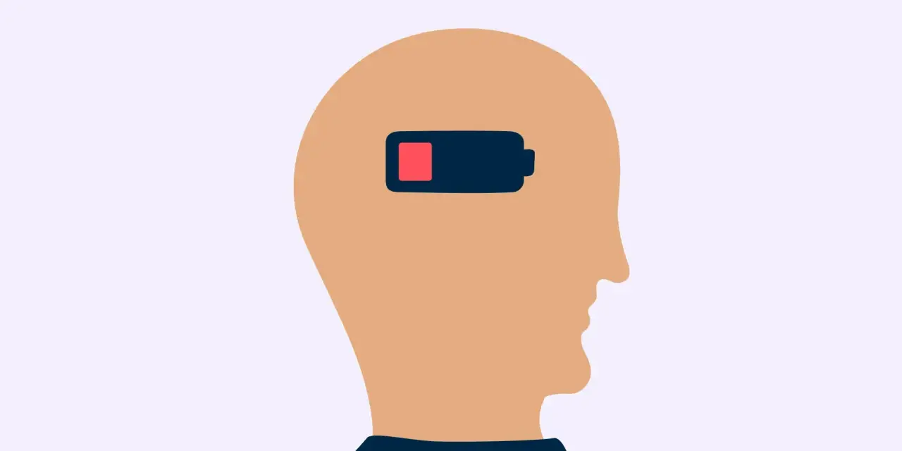 Profil av ett huvud med ett batteri som visar låg laddning, en symbol för emotionell utmattning.