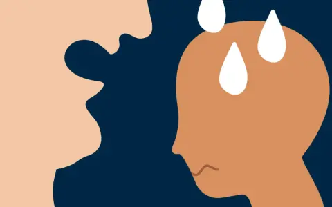 En person med svettpärlor på pannan och en orolig min möter en annan persons uttryckslösa ansikte. Omedveten psykisk misshandel kan lämna djupa spår.