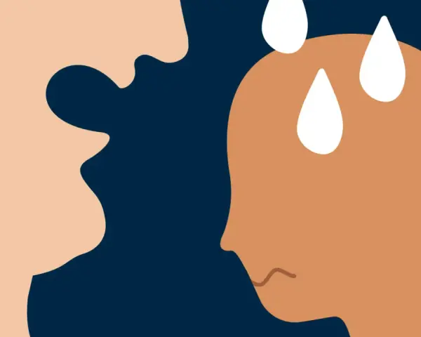 En person med svettpärlor på pannan och en orolig min möter en annan persons uttryckslösa ansikte. Omedveten psykisk misshandel kan lämna djupa spår.