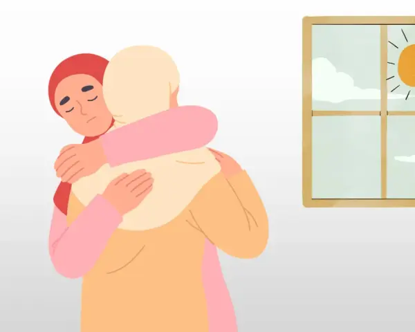 En ung person med depression kramar om någon. Utanför fönstret skiner solen.
